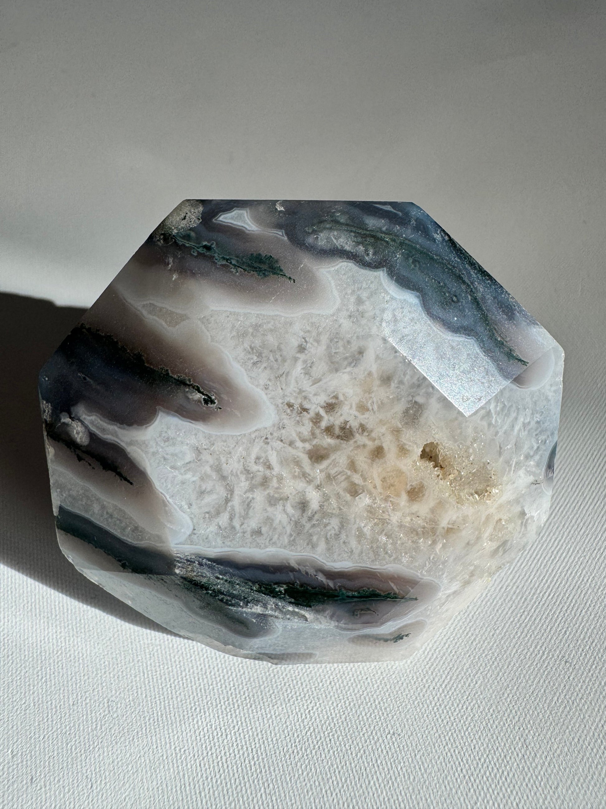 Side view of Moss Agate Crystal Diamond with intricate banding and druzy textures, suited for collectors of bespoke crystals.
