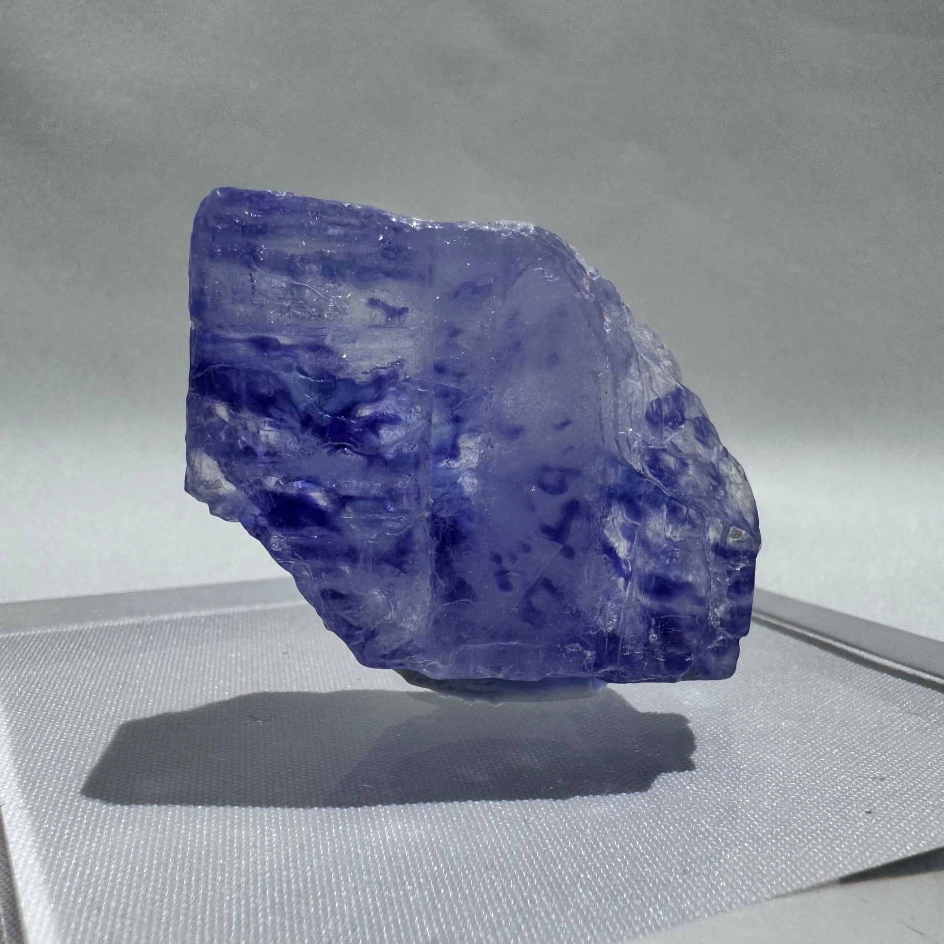 Blue Halite mineral specimen with soft lavender-blue tones and rough edges, a unique addition to any mineral or crystal collection.