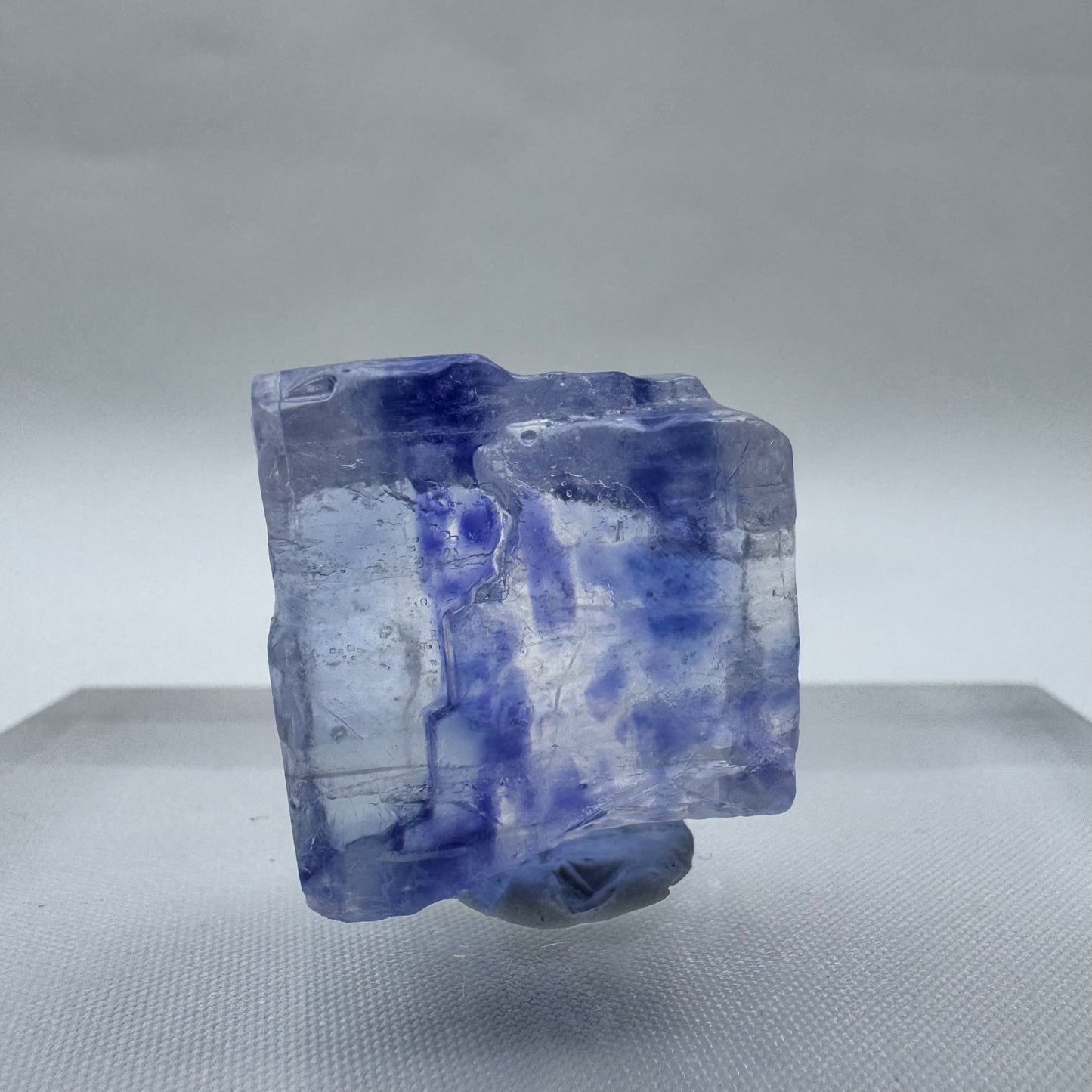 Flat Blue Halite Specimen with soft blue and purple veining, a rare collectible mineral for display or spiritual use.