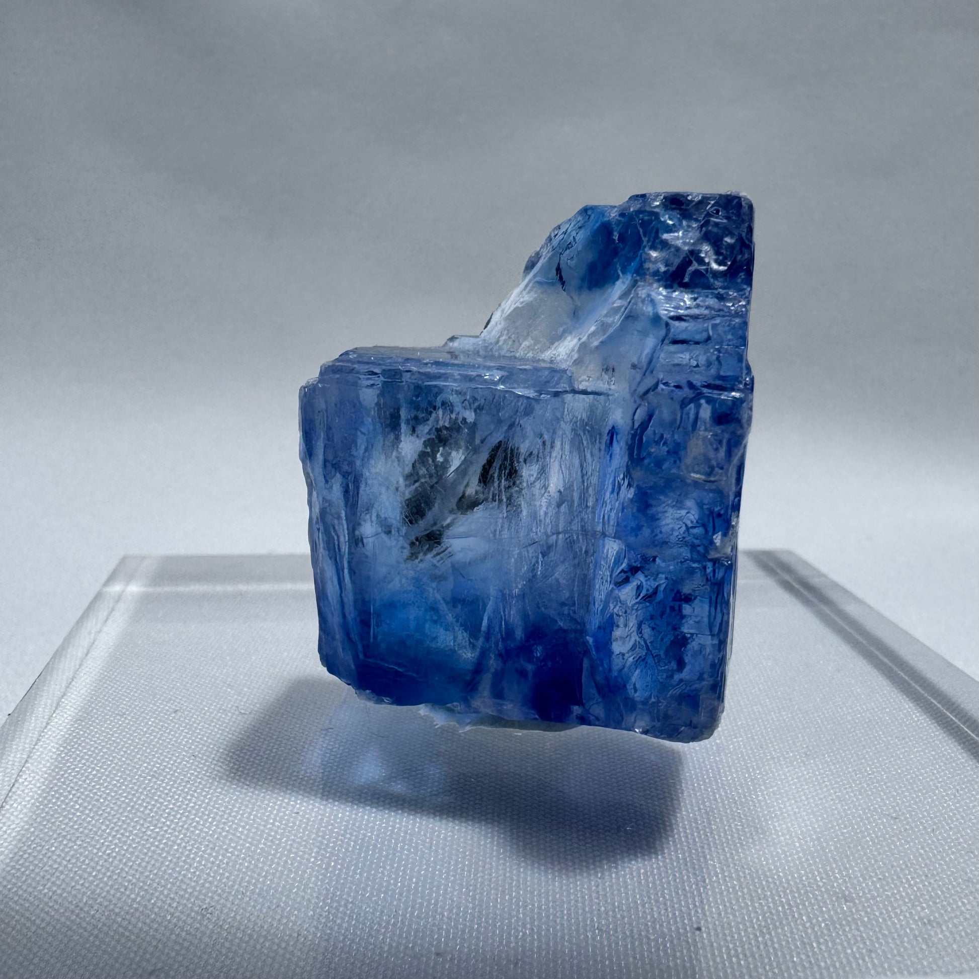 Raw Blue Halite Specimen with deep blue hues and natural fractures, perfect for display in mineral collections or metaphysical use.
