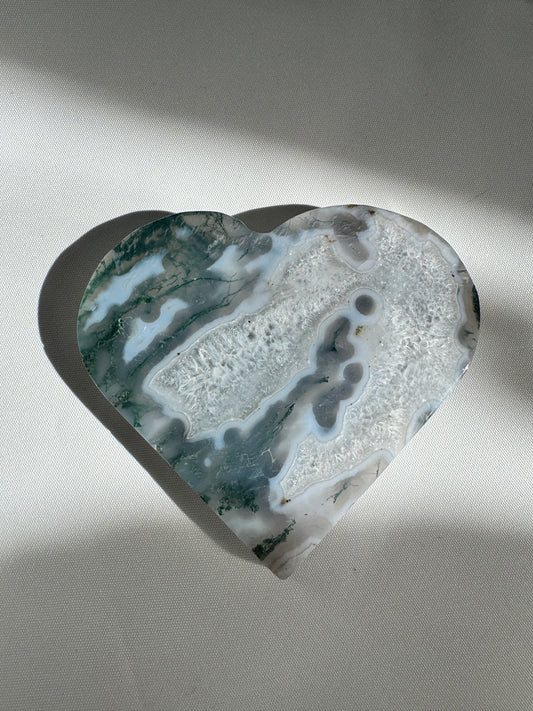 Heart-shaped Moss Agate crystal with green and white patterns