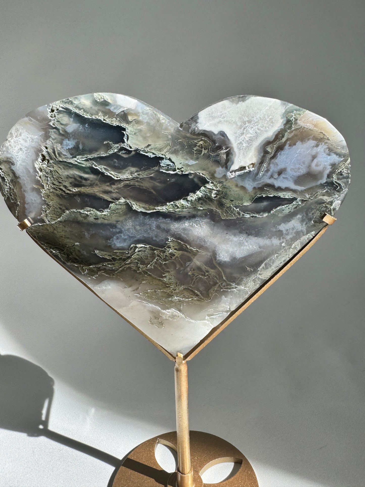 Close-up of Moss Agate Crystal heart with intricate mineral formations | Auckland NZ