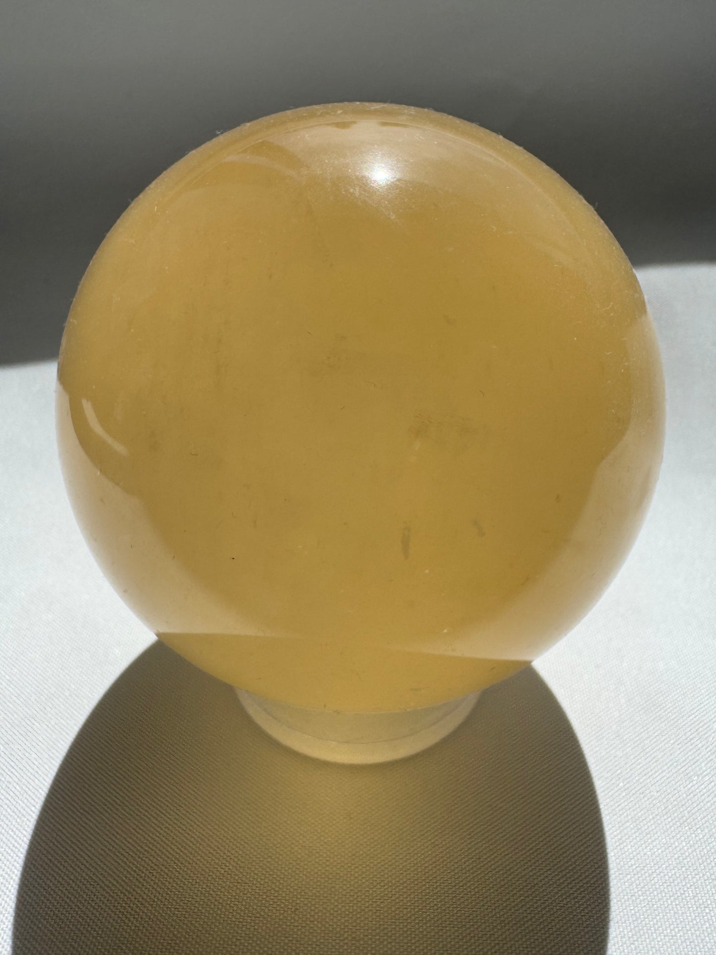 Rainbow Honey Calcite Crystal Sphere | Bespoke Crystals