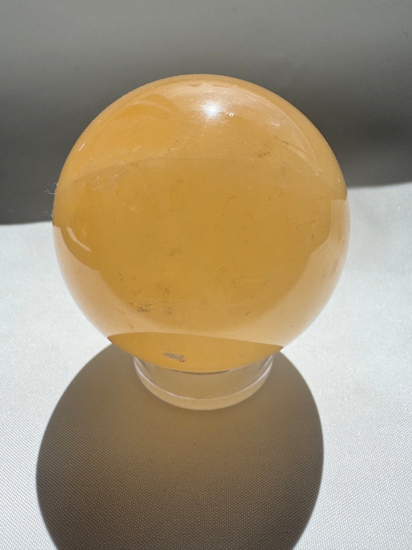 Rainbow Honey Calcite Crystal Sphere | Bespoke Crystals