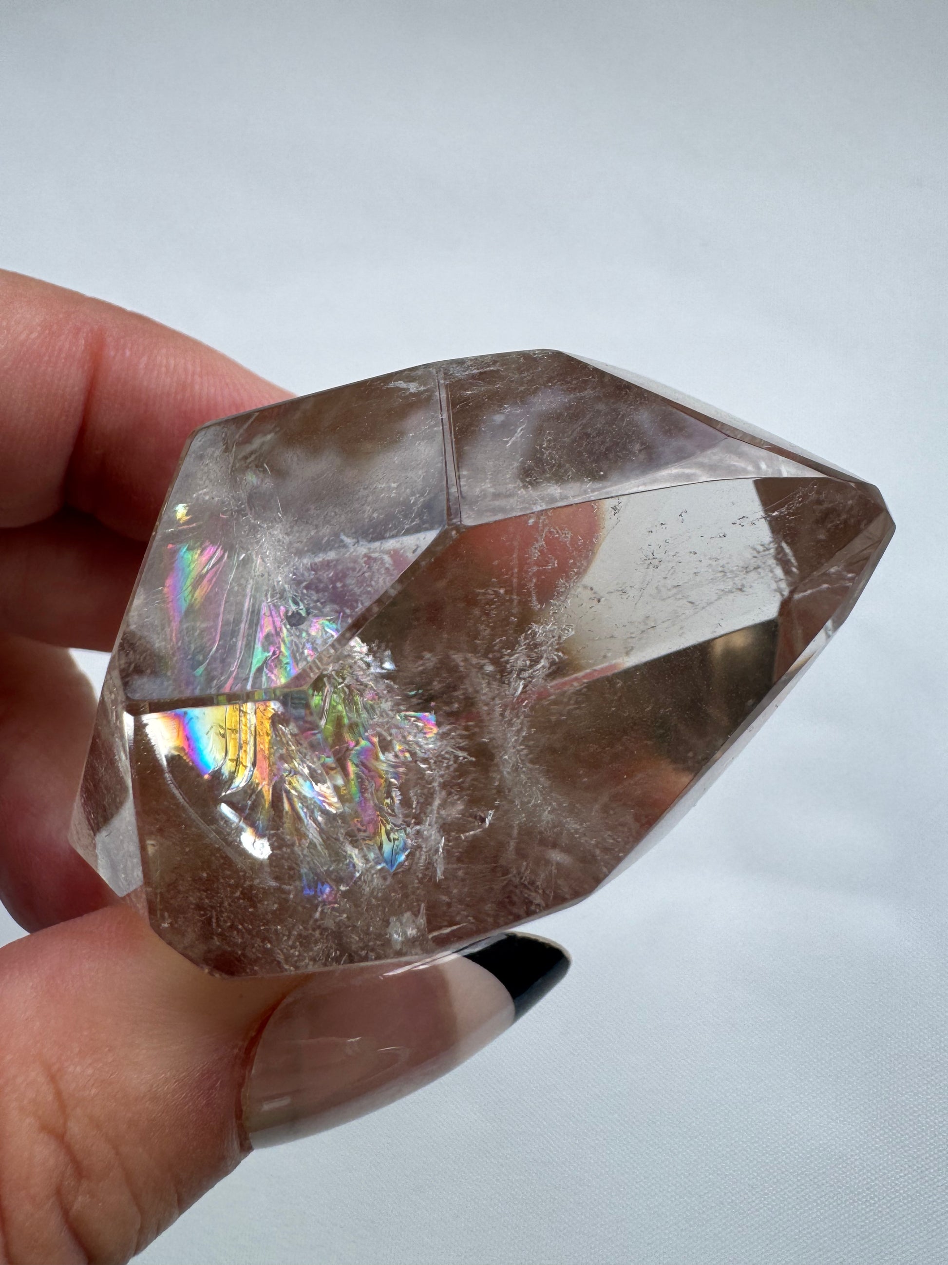 Close-up of smoky quartz freeform with internal fractures and rainbow reflections | Healing Crystals nz