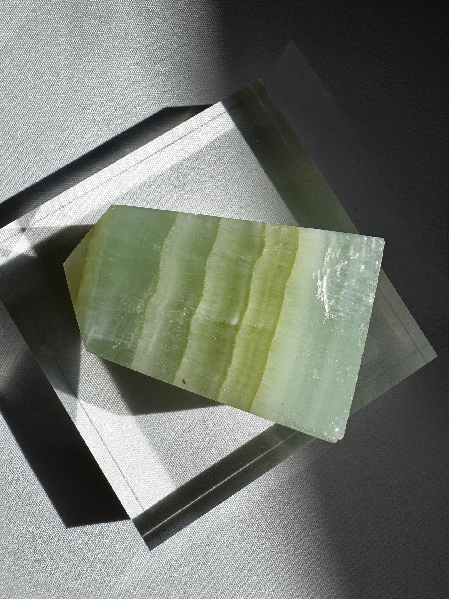 Horizontal view of Pistachio Calcite Crystal Mini Tower #5 | Bespoke Crystals