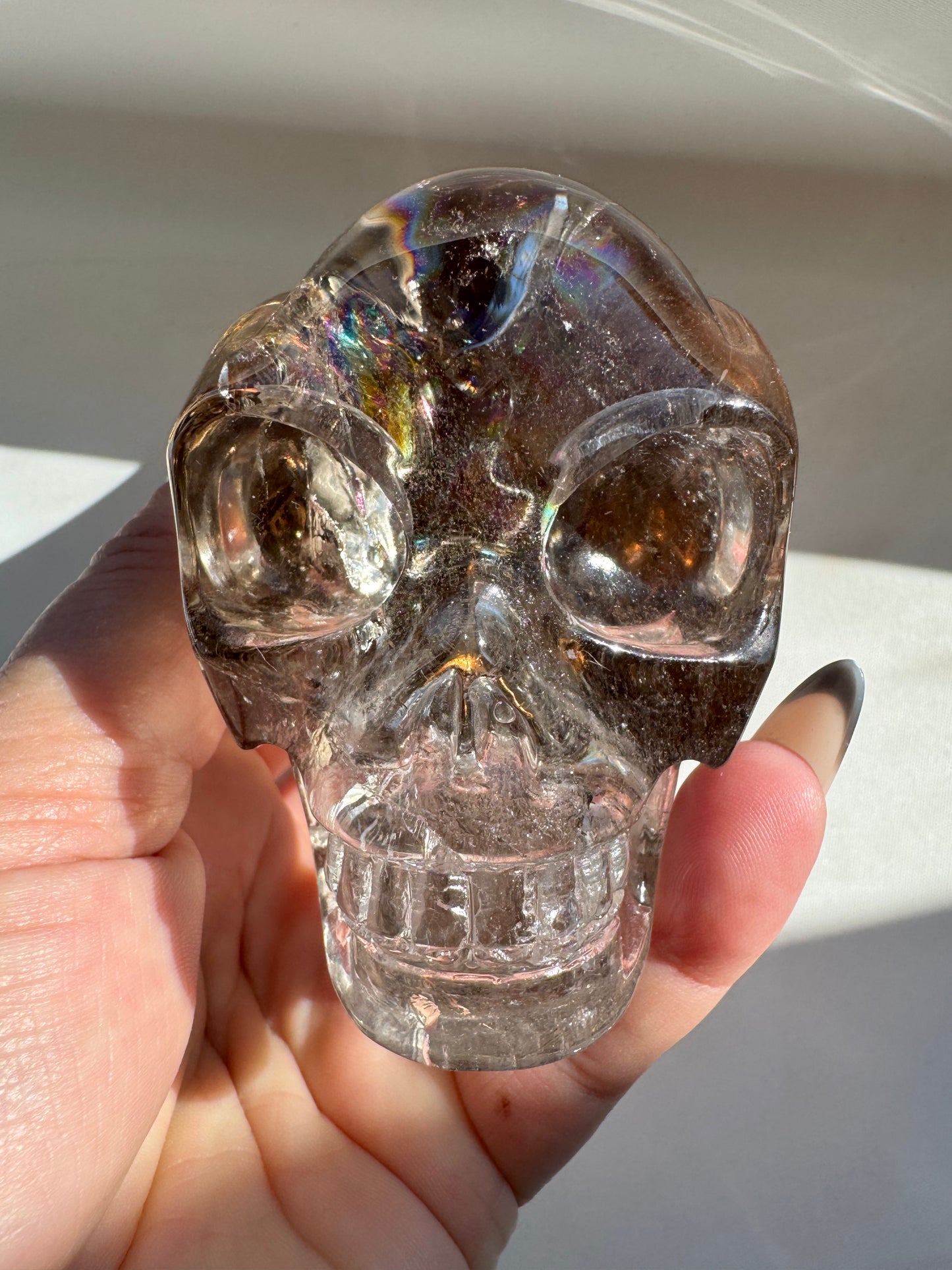 Crystal skull with rainbow reflections