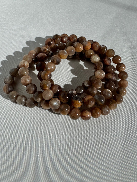 Peach Moonstone Bracelet - Emotional Balance | Growth Aid featuring polished round beads in earthy peach tones, ideal for feminine energy and healing.