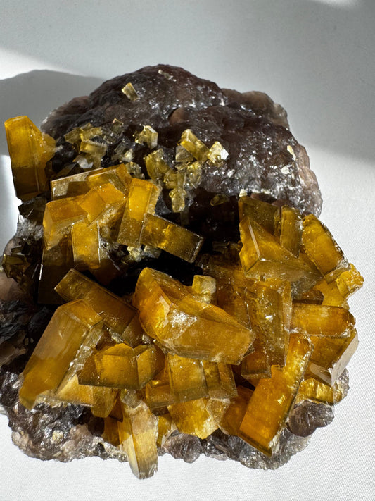Golden Barite Crystal on Boytroidal Purple Fluorite