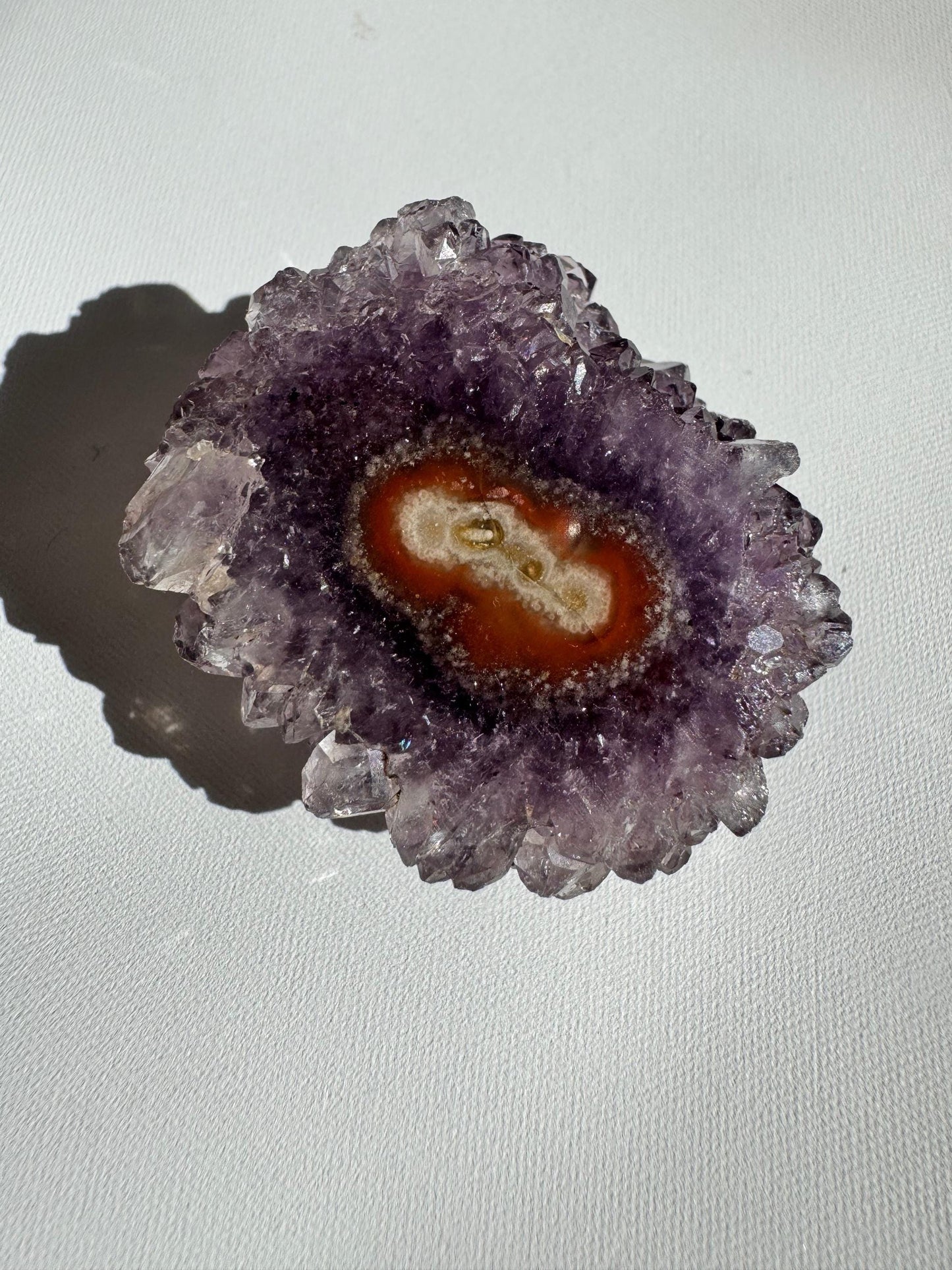 Amethyst Crystal Stalactite Grade A with radiant orange core and deep purple edges, a striking natural gemstone for collectors