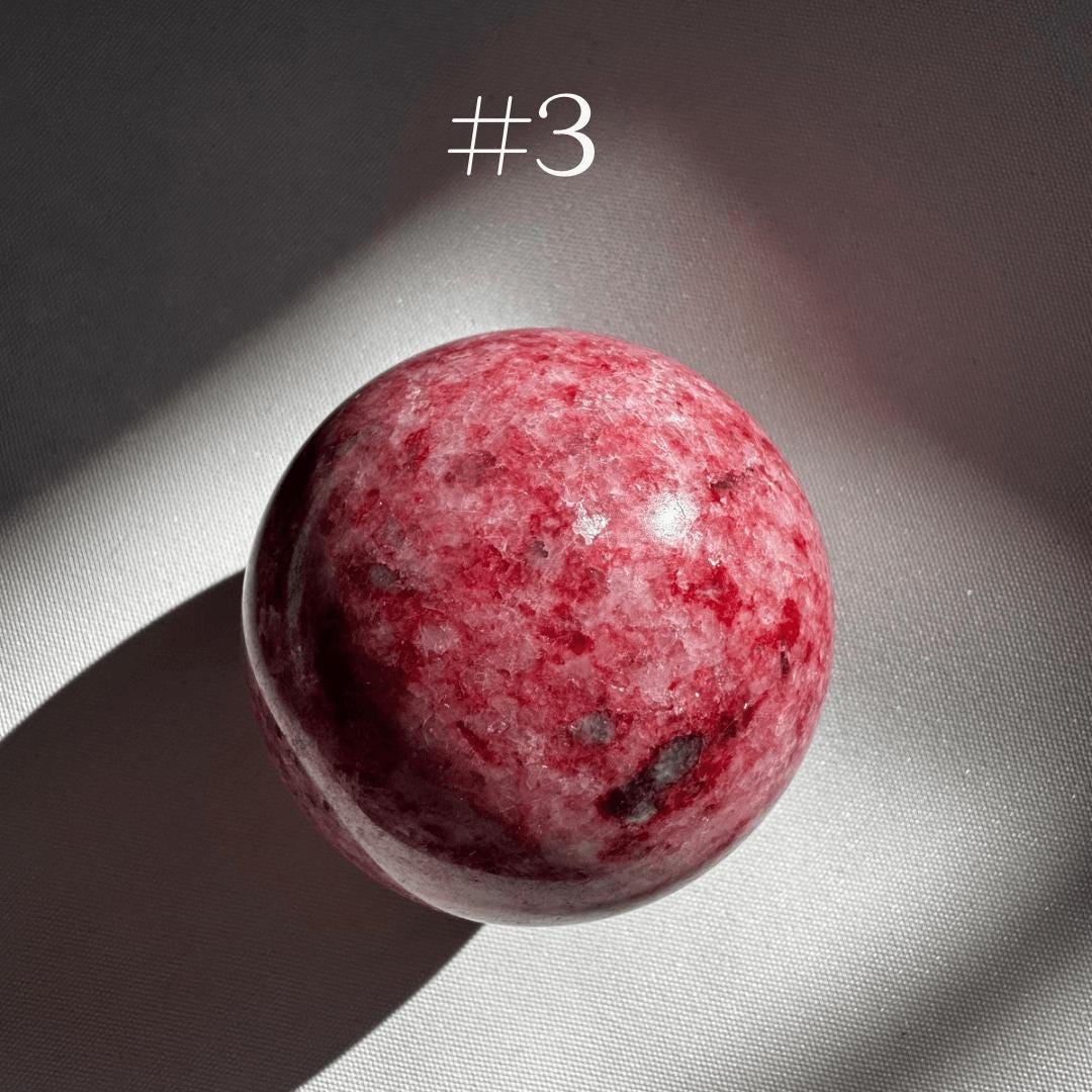 Pink Thulite Crystal Sphere #3 with vivid pink tones and natural inclusions, a rare collectible crystal