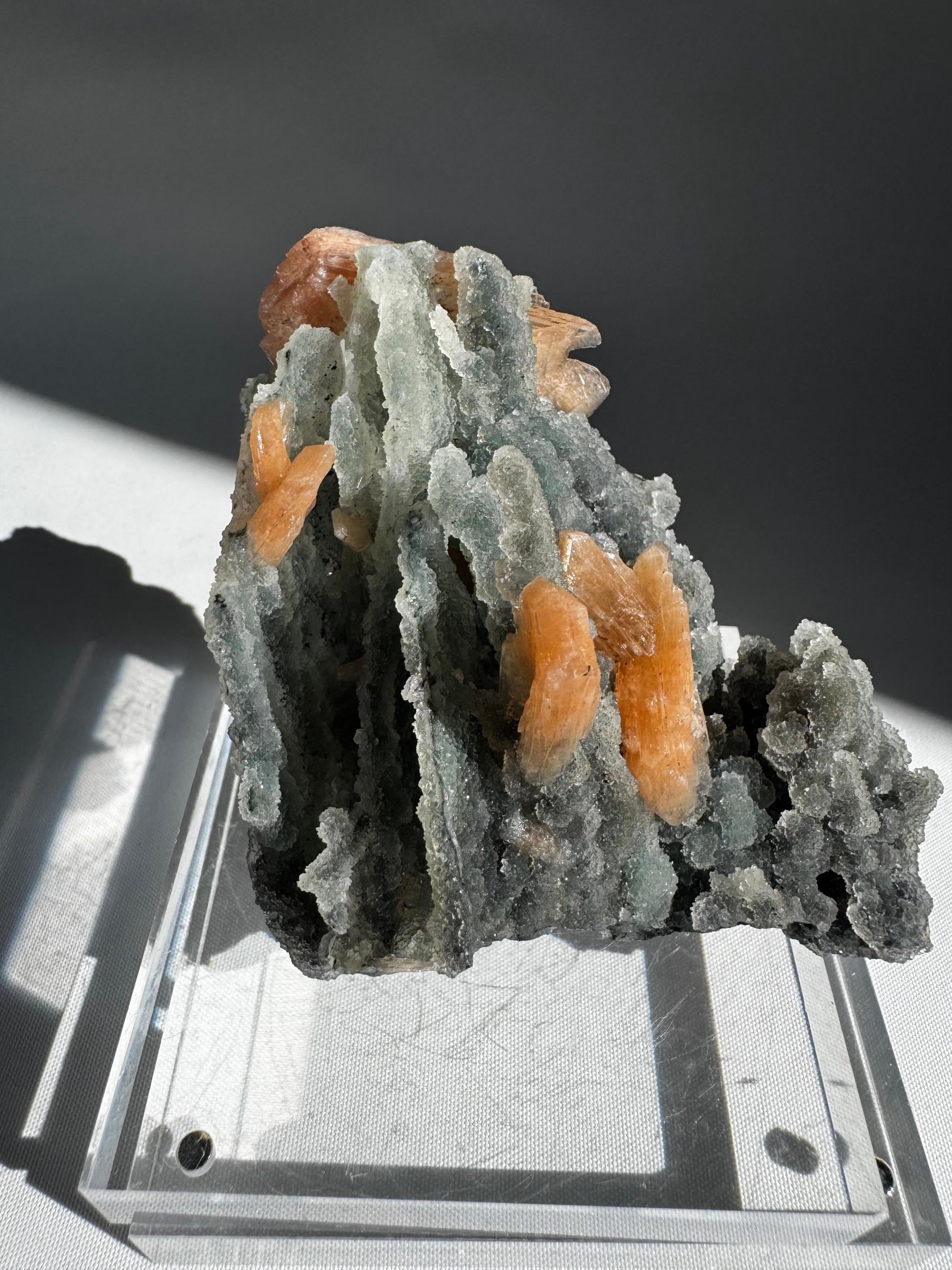 Side view of Chalcedony with Orange Stilbite Crystal #8 showing vertical Chalcedony formations with vibrant orange Stilbite, perfect for display or metaphysical use.