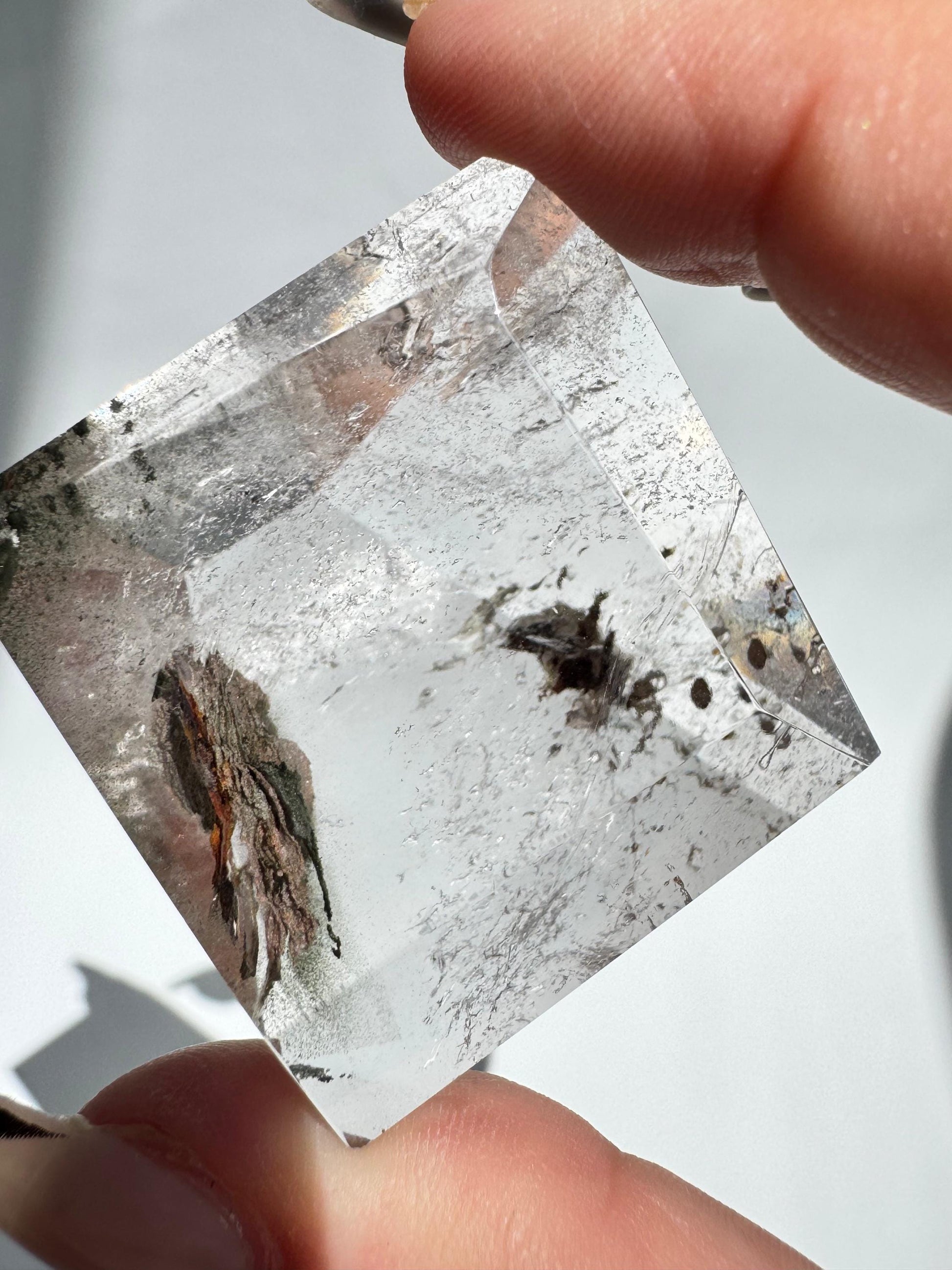 Clear Lodalite Freeform crystal with intricate natural inclusions. Ideal for collectors and meditation use in the gemstones category.